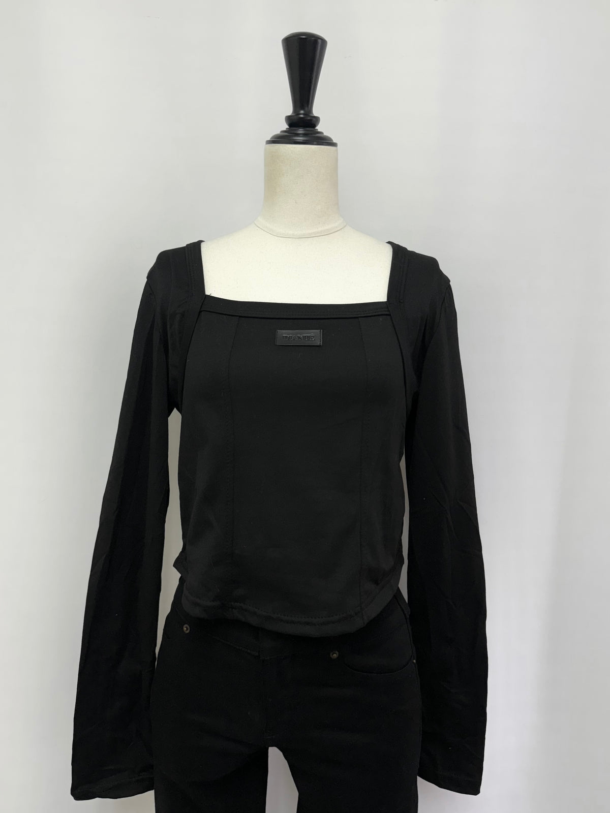 Round hem fishbone tops