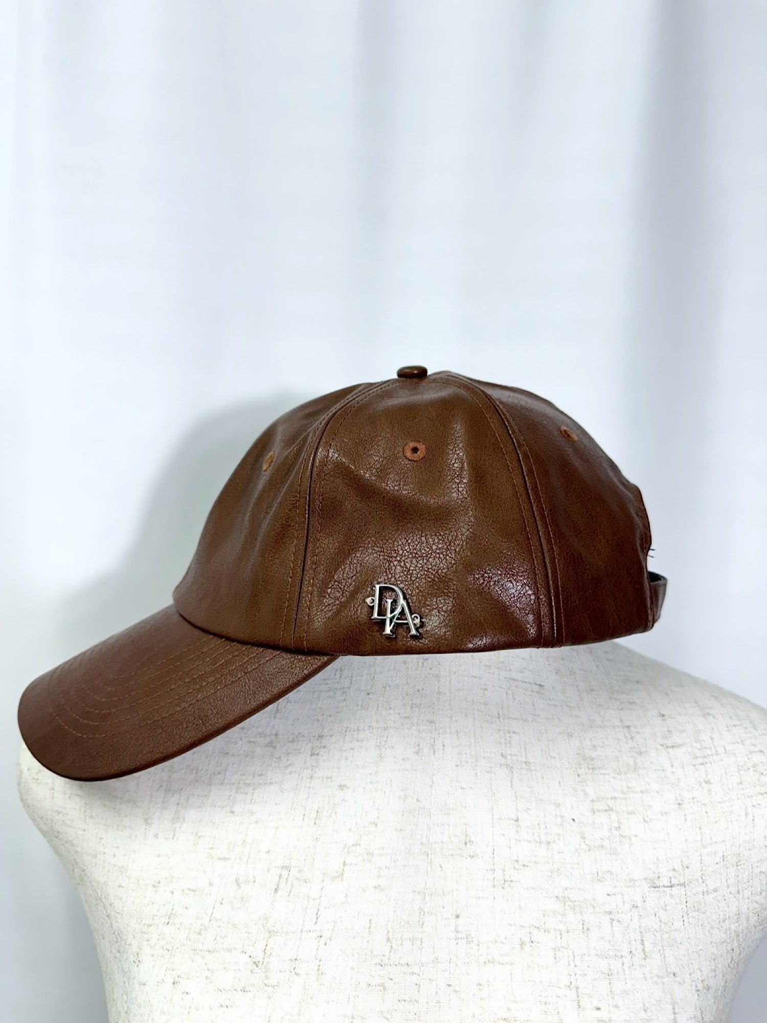 Initial logo leather cap