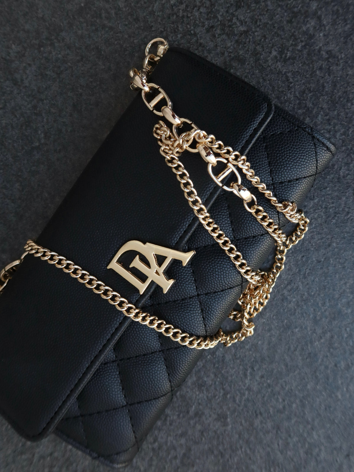 DIA buckle shoulder bag