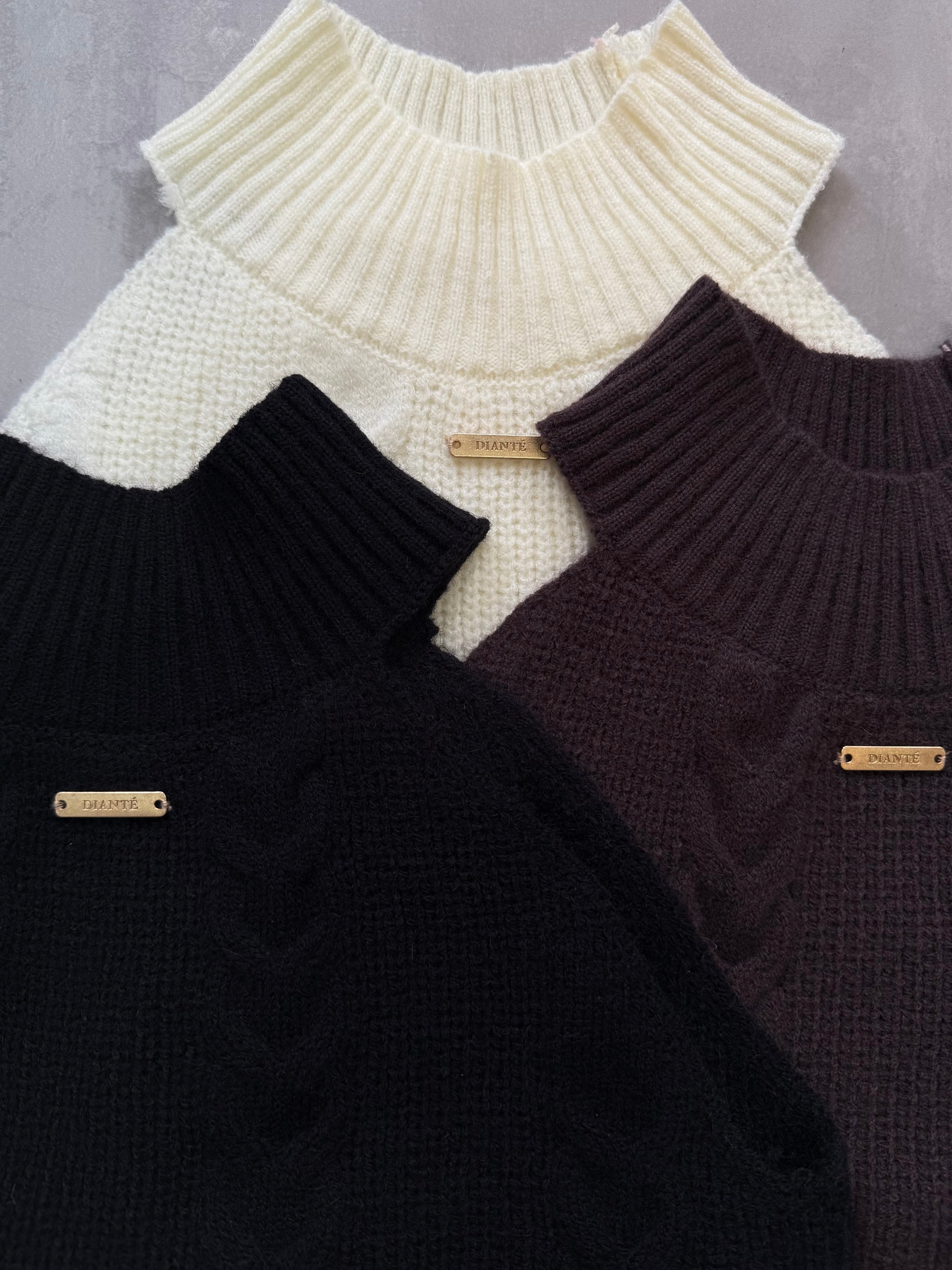 American sleeve cable knit
