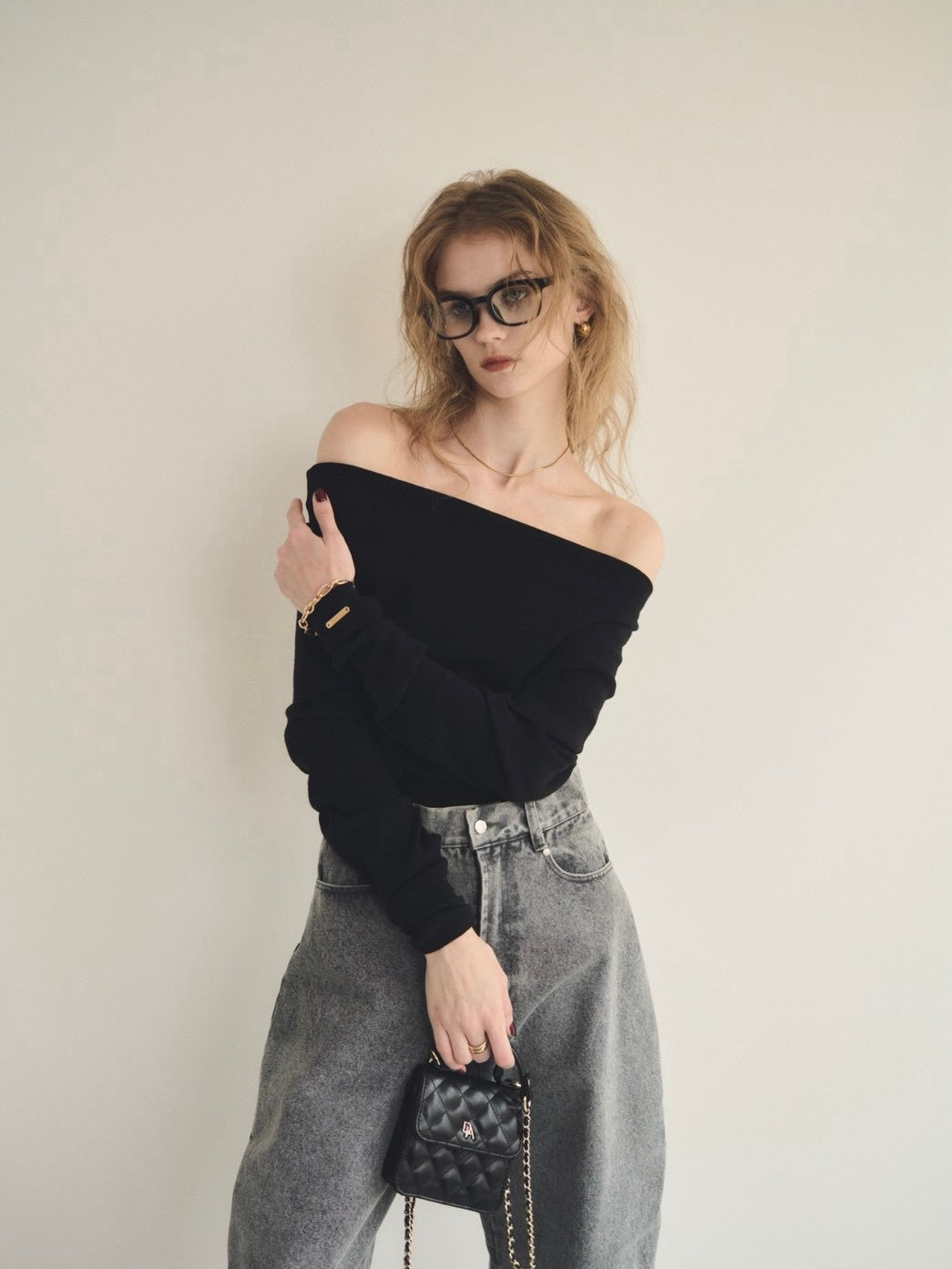 Loose flap off shoulder knit