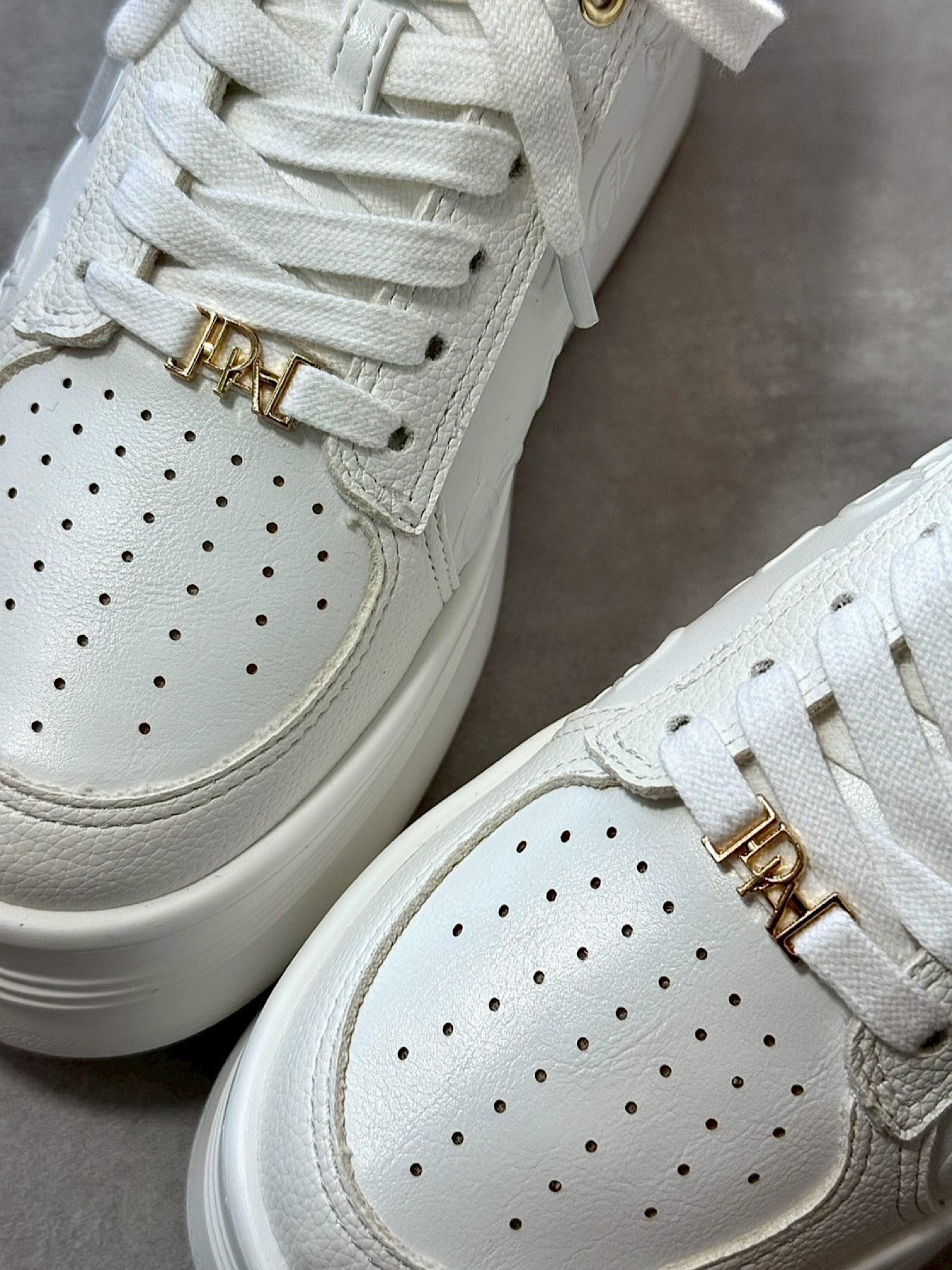 Emboss logo sole sneakers