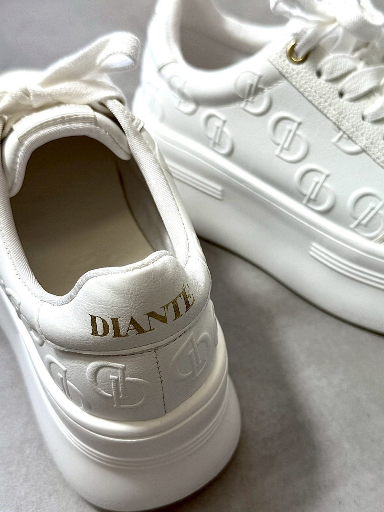 Emboss logo sole sneakers