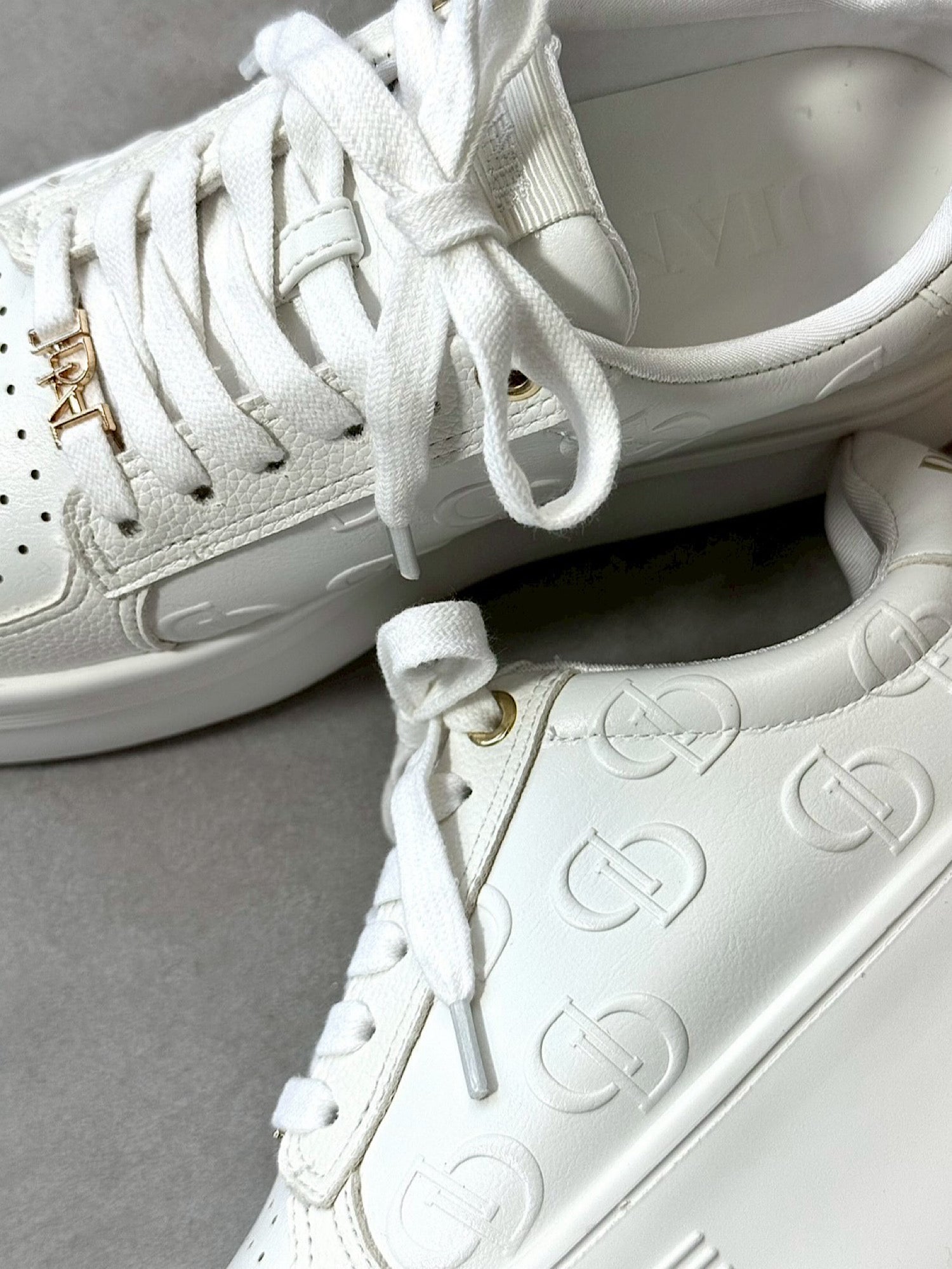Emboss logo sole sneakers