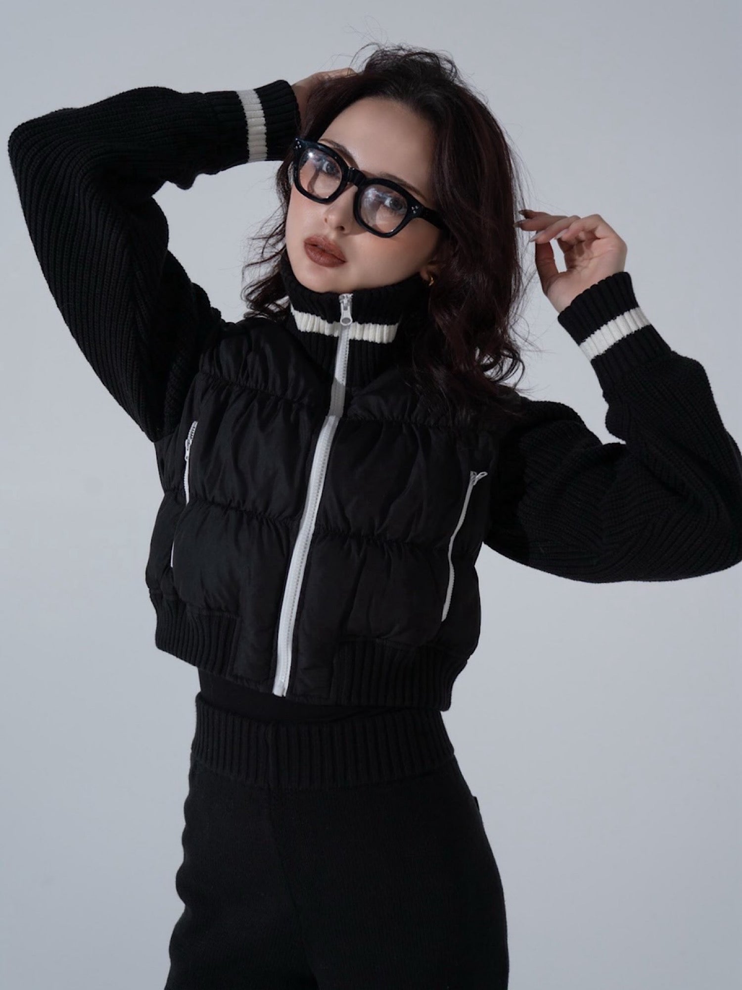 Accent color knit docking puffy blouson