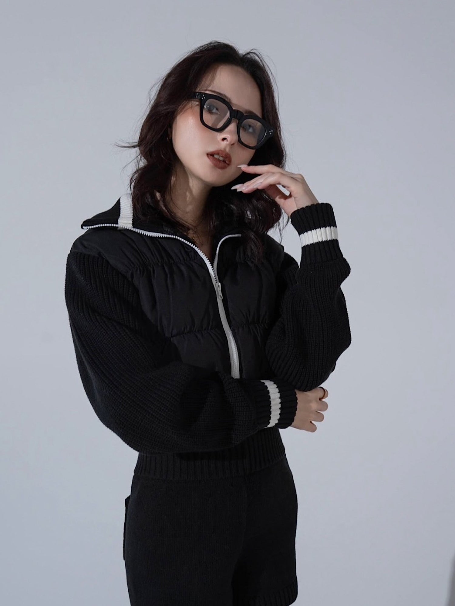 Accent color knit docking puffy blouson
